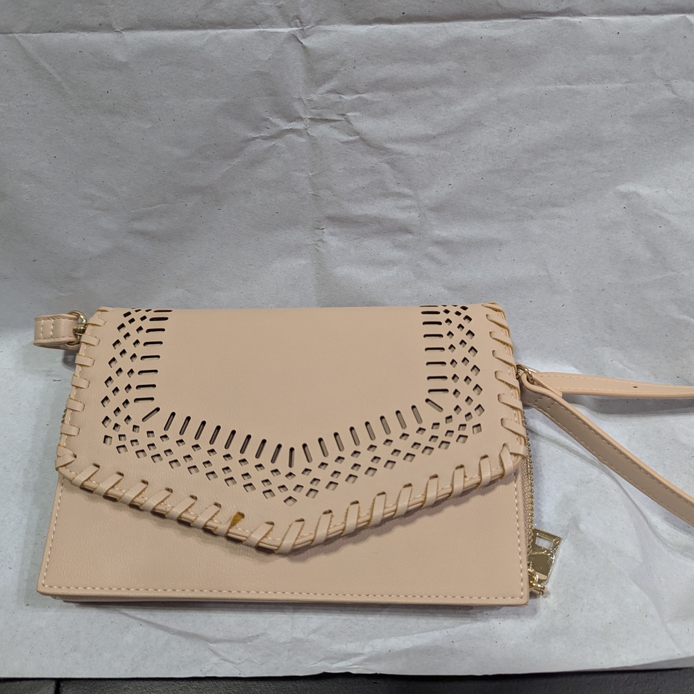 Light Pink Crossbody with Intricate Cut-Out Design and Flap Closure